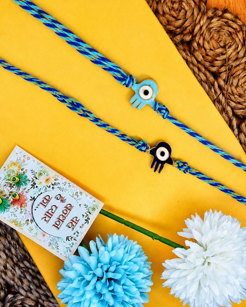 NVR Set of 2 Evil Eye & Blue Thread Rakhi with Roli Chawal Chandan Mishri | Grocsy
