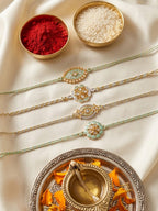 NVR Set of 4 White Artificial Stones & Green Thread Rakhi with Roli Chawal Chandan Mishri | Grocsy