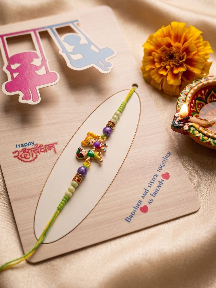 NVR Kids Multicolor Artificial Beads Thread Rakhi with Roli Chawal Chandan Chandan Mishri | Grocsy