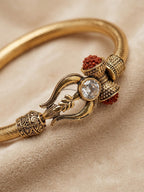 NVR Gold Plated Trishool Design Rudraksh Rakhi Bracelet with Roli Chawal Chandan Mishri | Grocsy
