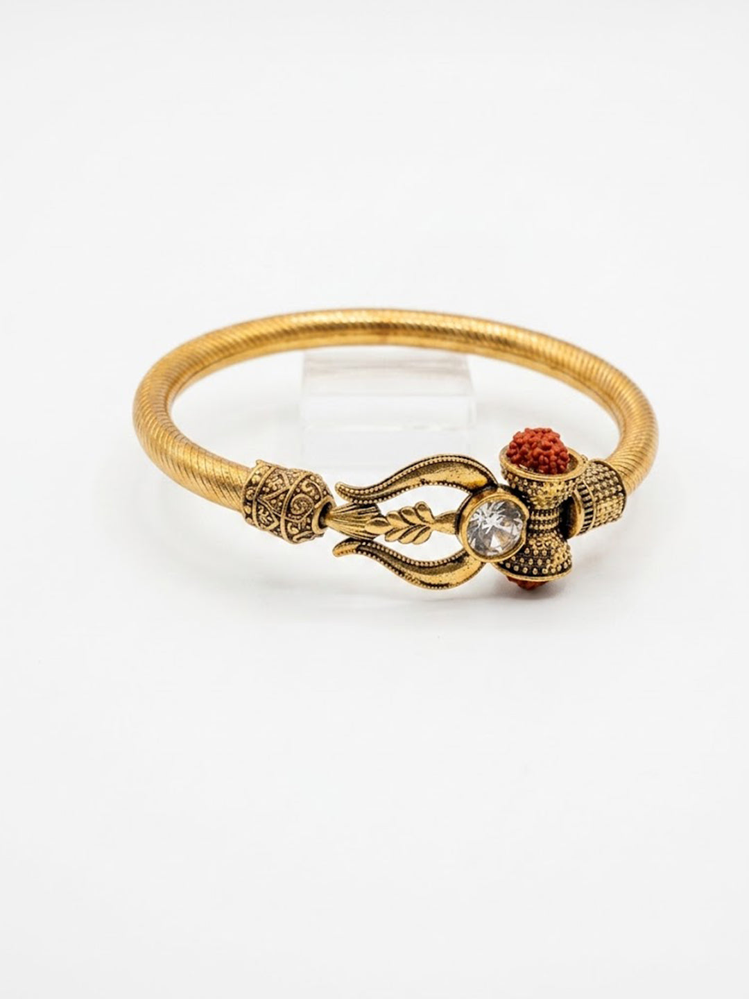 NVR Gold Plated Trishool Design Rudraksh Rakhi Bracelet with Roli Chawal Chandan Mishri | Grocsy