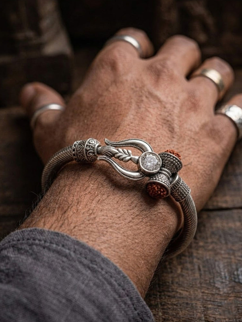NVR Silver Plated Trishool Design Rudraksh Rakhi Bracelet with Roli Chawal Chandan Mishri | Grocsy