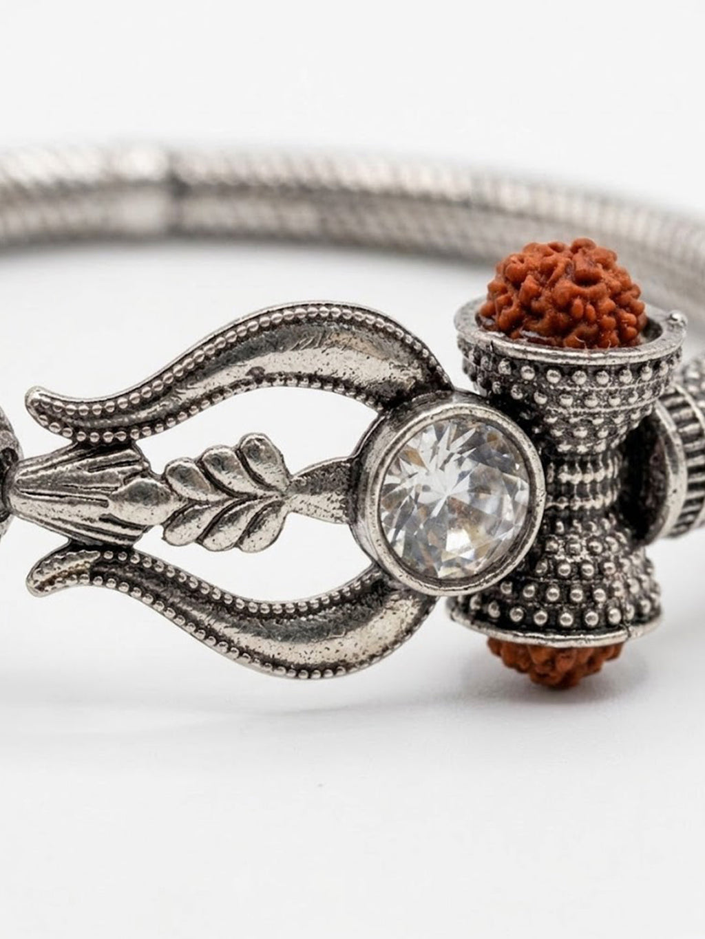 NVR Silver Plated Trishool Design Rudraksh Rakhi Bracelet with Roli Chawal Chandan Mishri | Grocsy