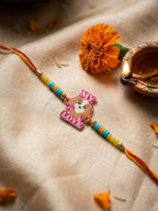 NVR Stylish Artificial Beads Kids Thread Rakhi with Roli Chawal Chandan Mishri | Grocsy
