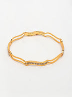 NVR Women's Set of 4 Gold-Polished Cubic Zirconia Stone Studded Bangles | Grocsy