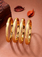 NVR Women's Set of 4 Gold-Polished Traditional Bangles | Grocsy
