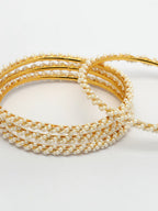 NVR Women Set of 4 Gold-Polished Pearls Handcrafted Traditional Bangles