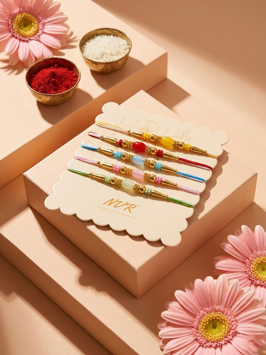 NVR Set of 5 Multi Artificial Beads Thread Rakhi with Roli Chawal Chandan Mishri | Grocsy
