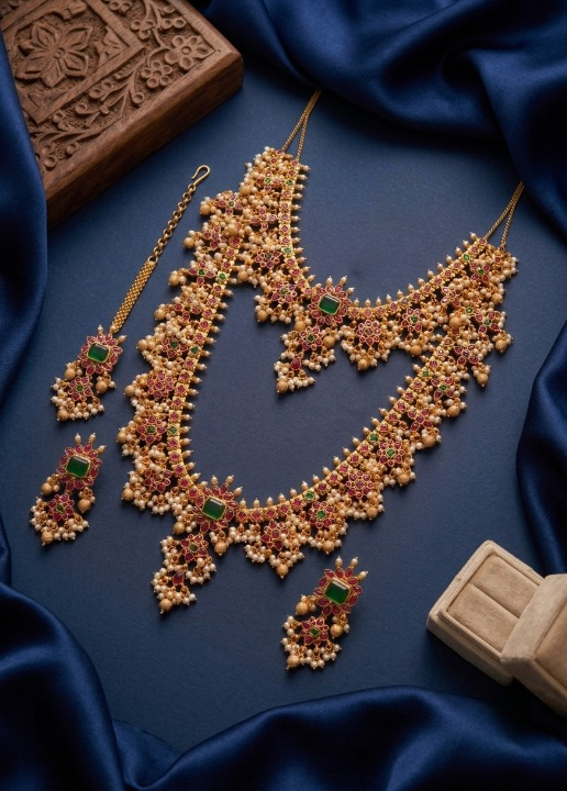 Jewel City Gold Plated Ruby Emerald Pearl Long Haram Necklace, Earrings & Maang Tikka | Grocsy