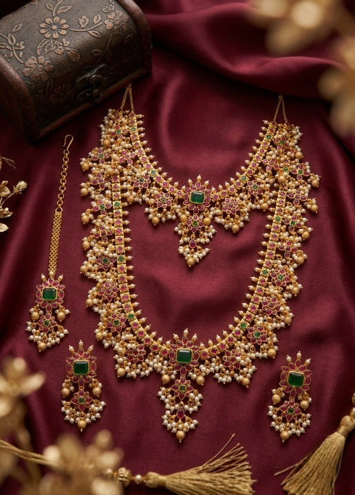 Jewel City Gold Plated Ruby Emerald Pearl Long Haram Necklace, Earrings & Maang Tikka | Grocsy