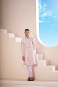 A Pink Sherwani Featuring Elegant Cross-Line Patterns Adorned With Intricate Floral Designs by Hilo Design | Grocsy