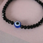 NVR Men & Women Black Evil Eye Crystal Elasticated Bracelet | Grocsy