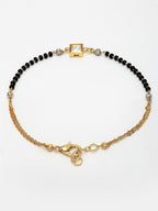 NVR Women Gold-Polished & Black Brass Stone-Studded Hand Mangalsutra Link Bracelet | Grocsy