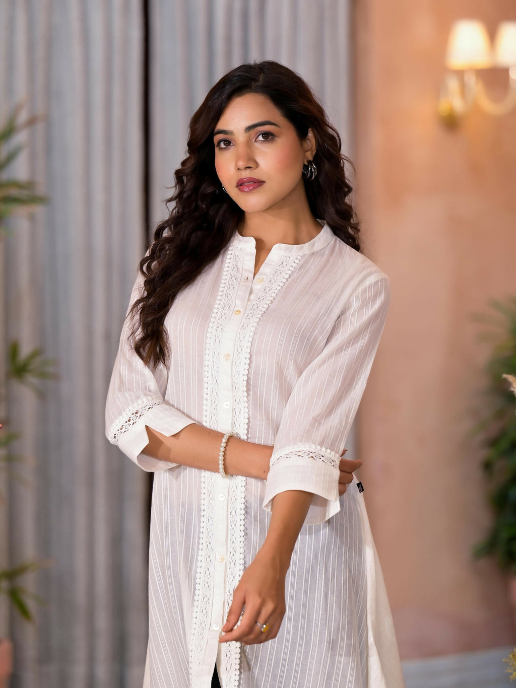 Juniper Women's Off White Thread Embroidered Cotton Asymmetrical Kurta With Button Closure | Grocsy