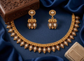 Jewel City White Antique Gold Matte Temple Jewelry Set | Grocsy