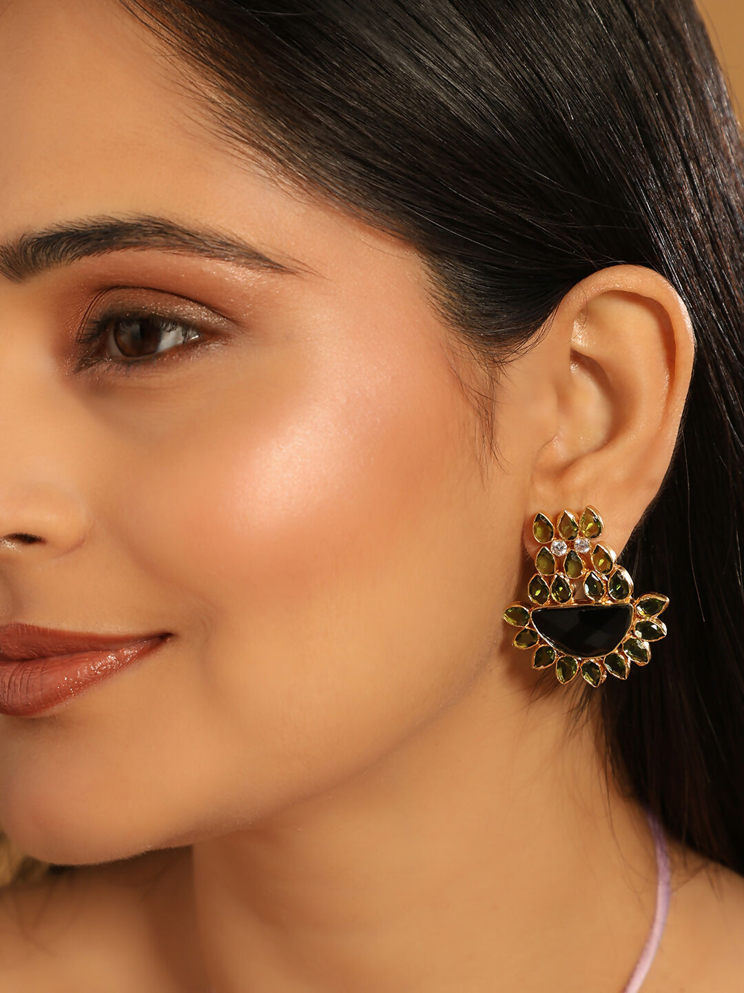 Nuyug 22K Gold Plated Dark Crystal Studded Contemporary Floral Shaped Stud Earrings | Grocsy