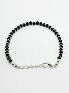NVR Women Silver Plated Black Beaded Adjustable Rakhi With Roli Chawal | Grocsy