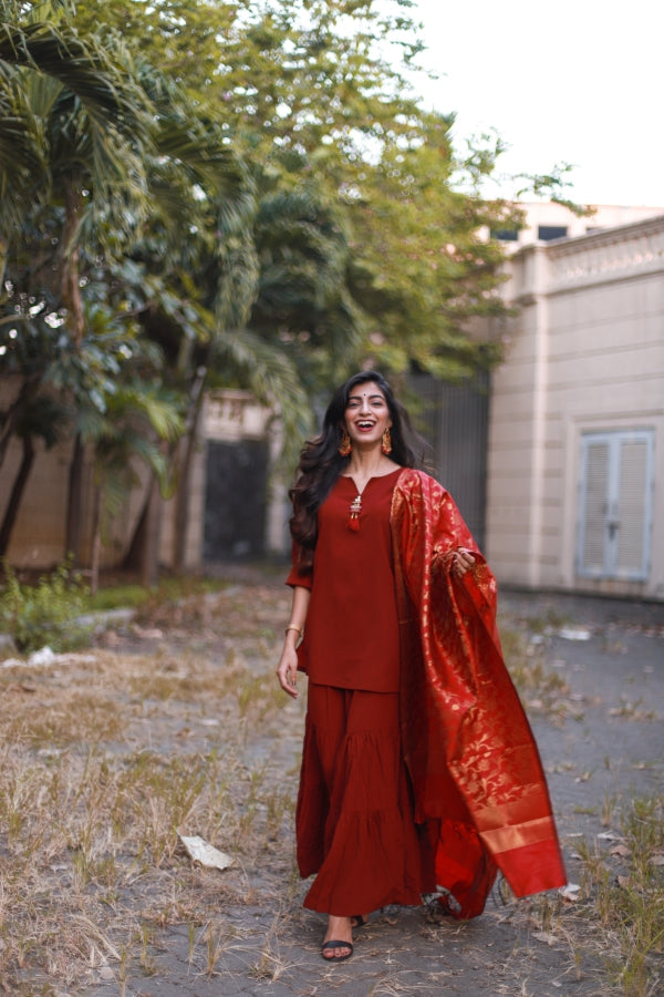 Jompers Women Maroon & Golden Solid Kurti with Sharara & Woven Design Dupatta | Grocsy