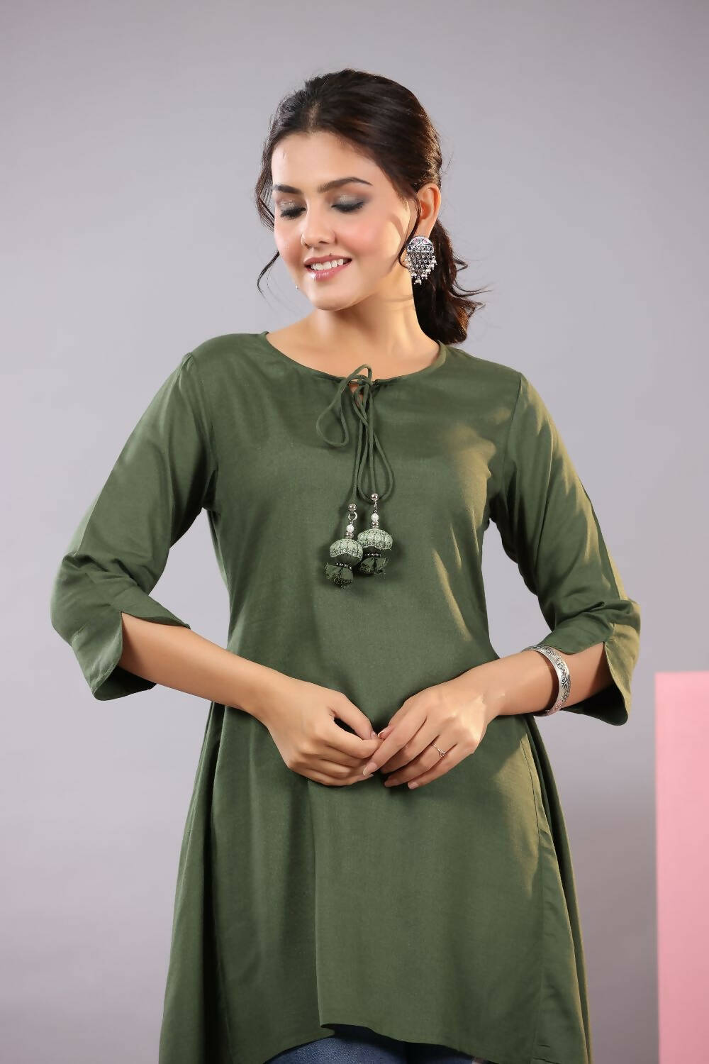 Juniper Women Olive Rayon Solid Asymmetric Kurta | Grocsy