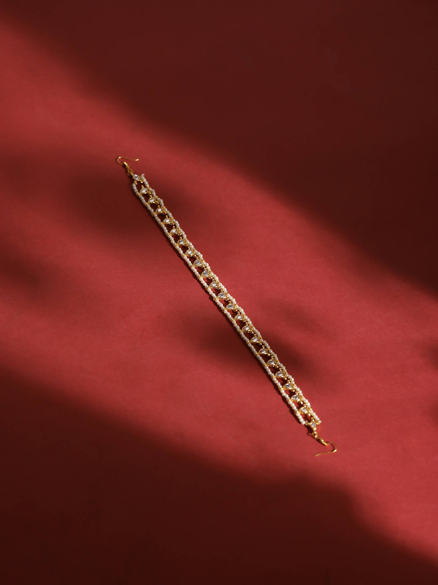 Gold-Polished White Kundan-Studded Pearl Beaded Hair Band - Ruby Raang | Grocsy