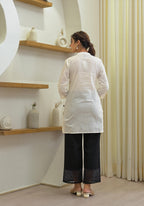 Juniper Women's White Solid Cotton Tunic With Schiffli Work | Grocsy