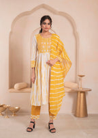 Juniper Mustered and white kurta , solid bottom and tie - dye dupatta with cotton lace , buttons , sequence | Grocsy