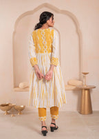 Juniper Mustered and white kurta , solid bottom and tie - dye dupatta with cotton lace , buttons , sequence | Grocsy