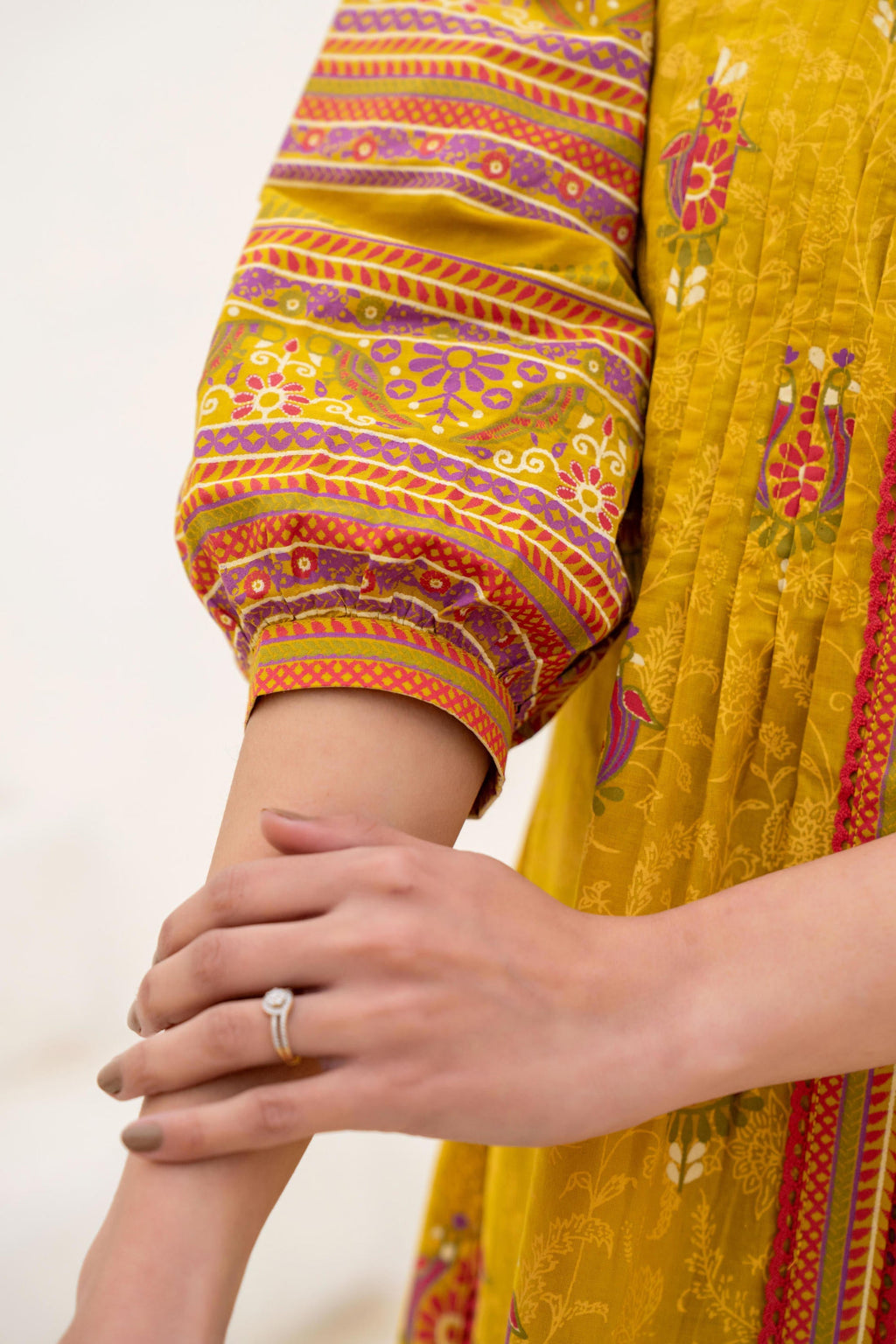 Juniper Mustard Printed Pleated Tunic with Puff Sleeves | Grocsy