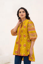 Juniper Mustard Printed Pleated Tunic with Puff Sleeves | Grocsy