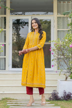 Juniper Women's Mustard Floral Printed Cotton Kurta With Thread Work & Lace | Grocsy