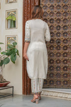 Juniper Off white printed kurta , Printed bottom and floral dupatta with dori and tassel | Grocsy