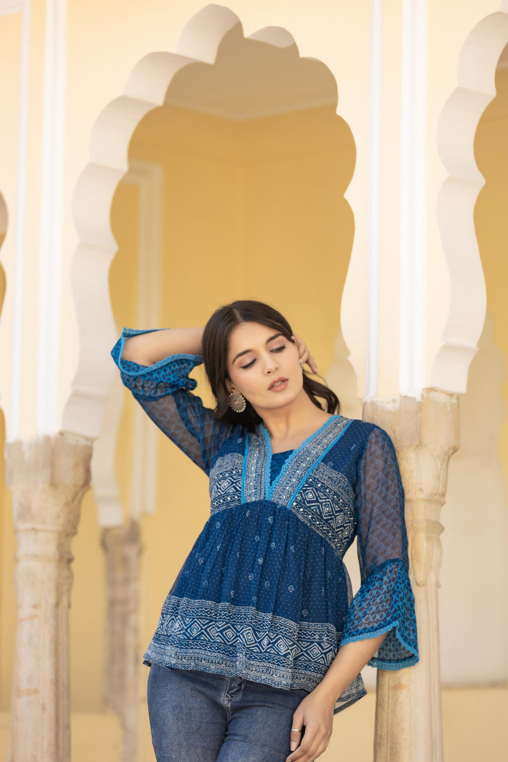 Juniper Indigo Blue Ethnic Motif Peplum Top with Sheer Sleeves | Grocsy
