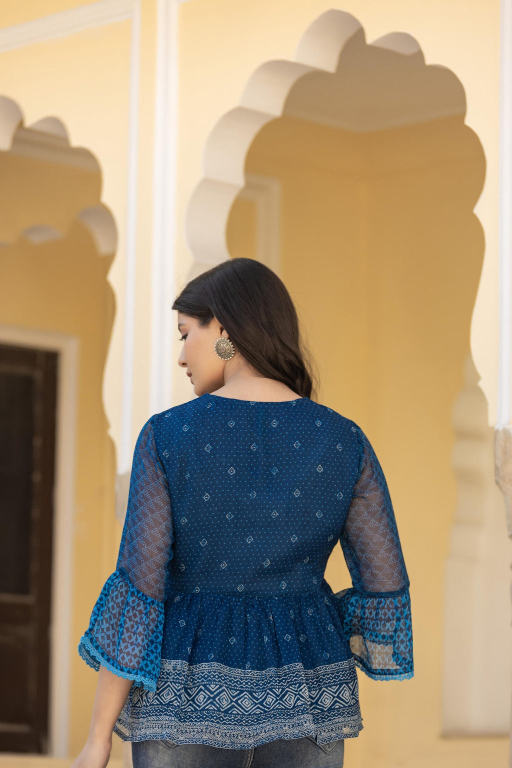 Juniper Indigo Blue Ethnic Motif Peplum Top with Sheer Sleeves | Grocsy