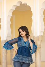 Juniper Indigo Blue Ethnic Motif Peplum Top with Sheer Sleeves | Grocsy