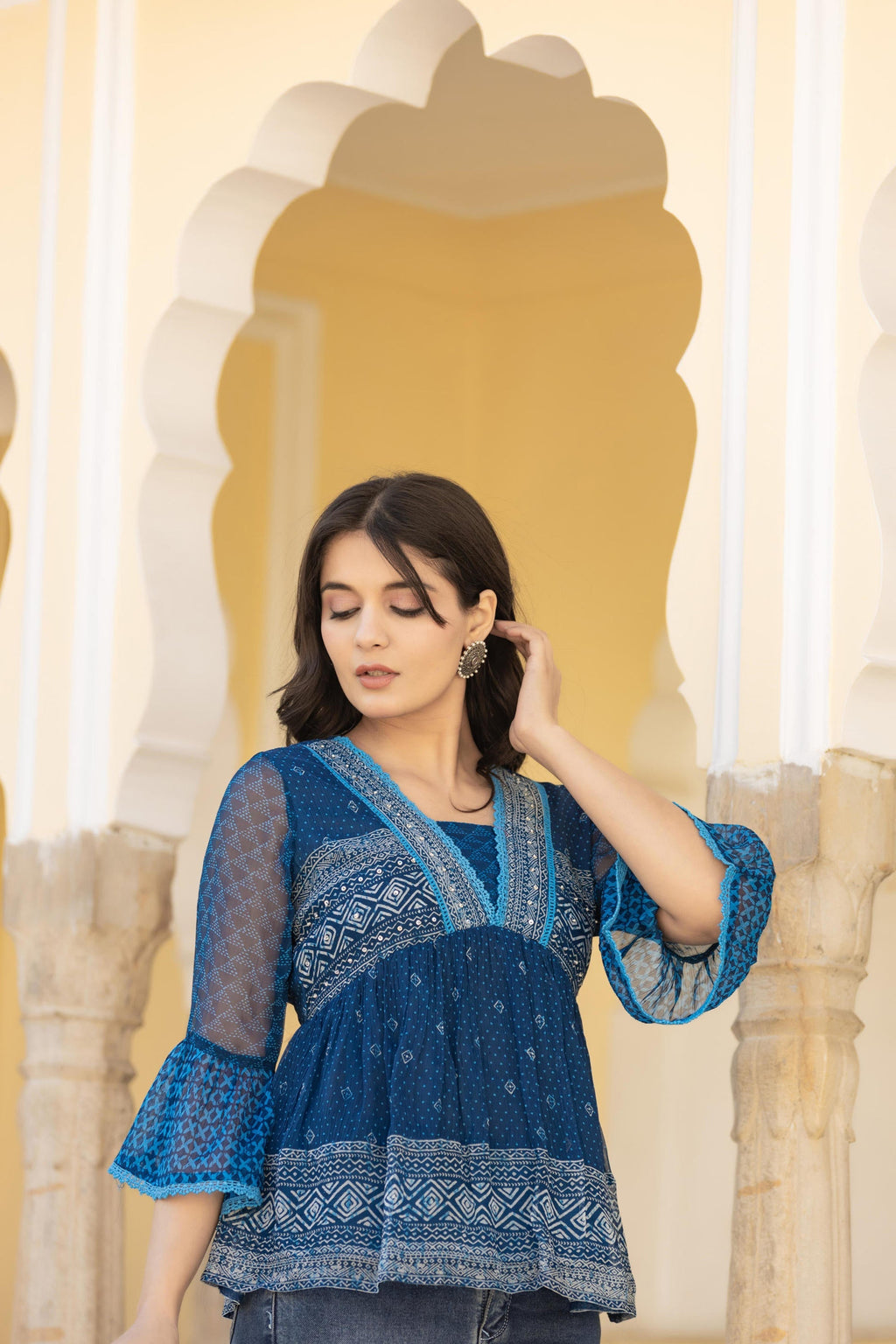 Juniper Indigo Blue Ethnic Motif Peplum Top with Sheer Sleeves | Grocsy