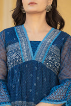Juniper Indigo Blue Ethnic Motif Peplum Top with Sheer Sleeves | Grocsy
