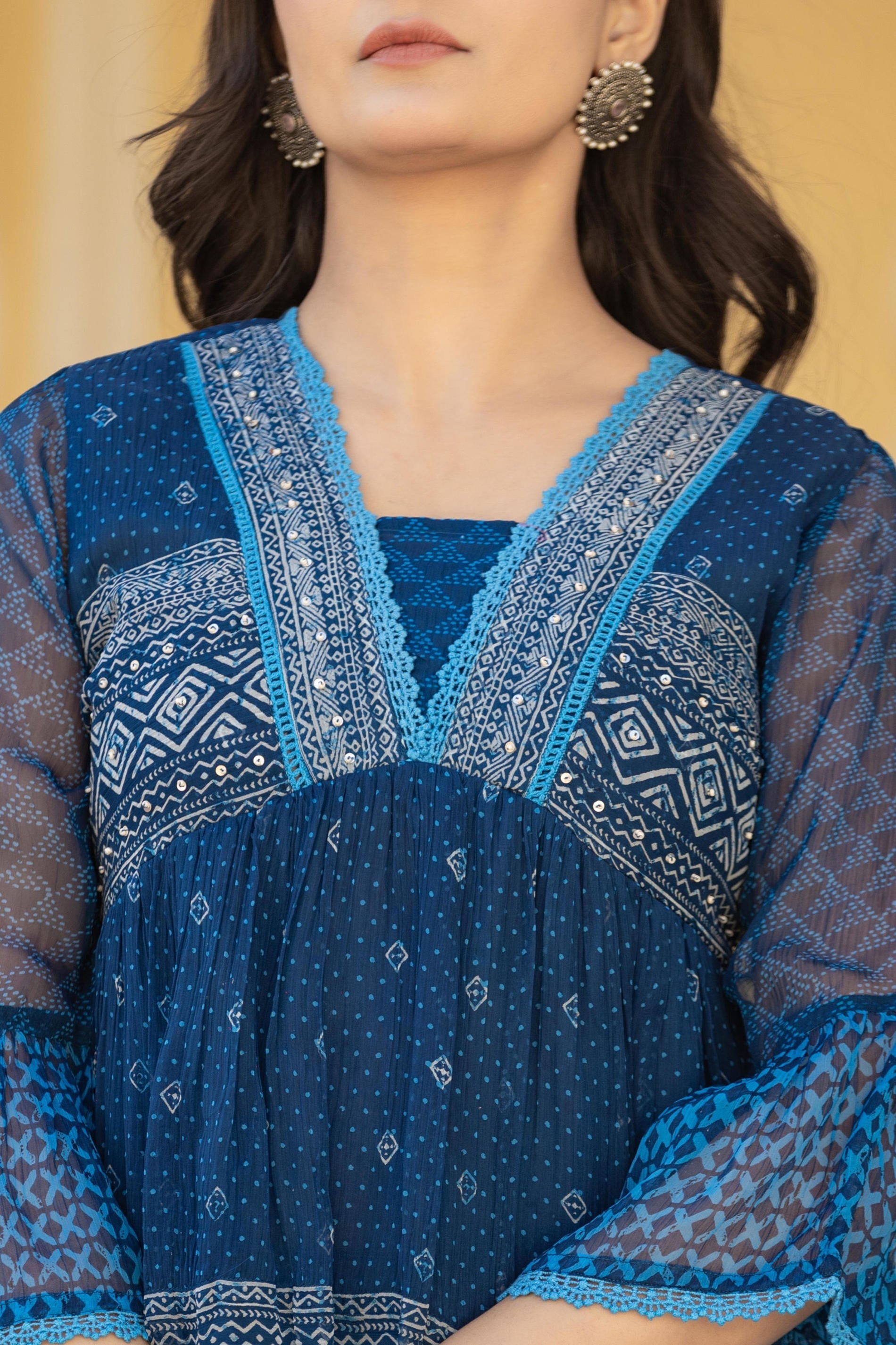 Juniper Indigo Blue Ethnic Motif Peplum Top with Sheer Sleeves | Grocsy
