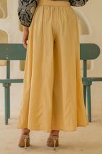 Juniper Gold Solid Viscose Palazzo Pants | Grocsy