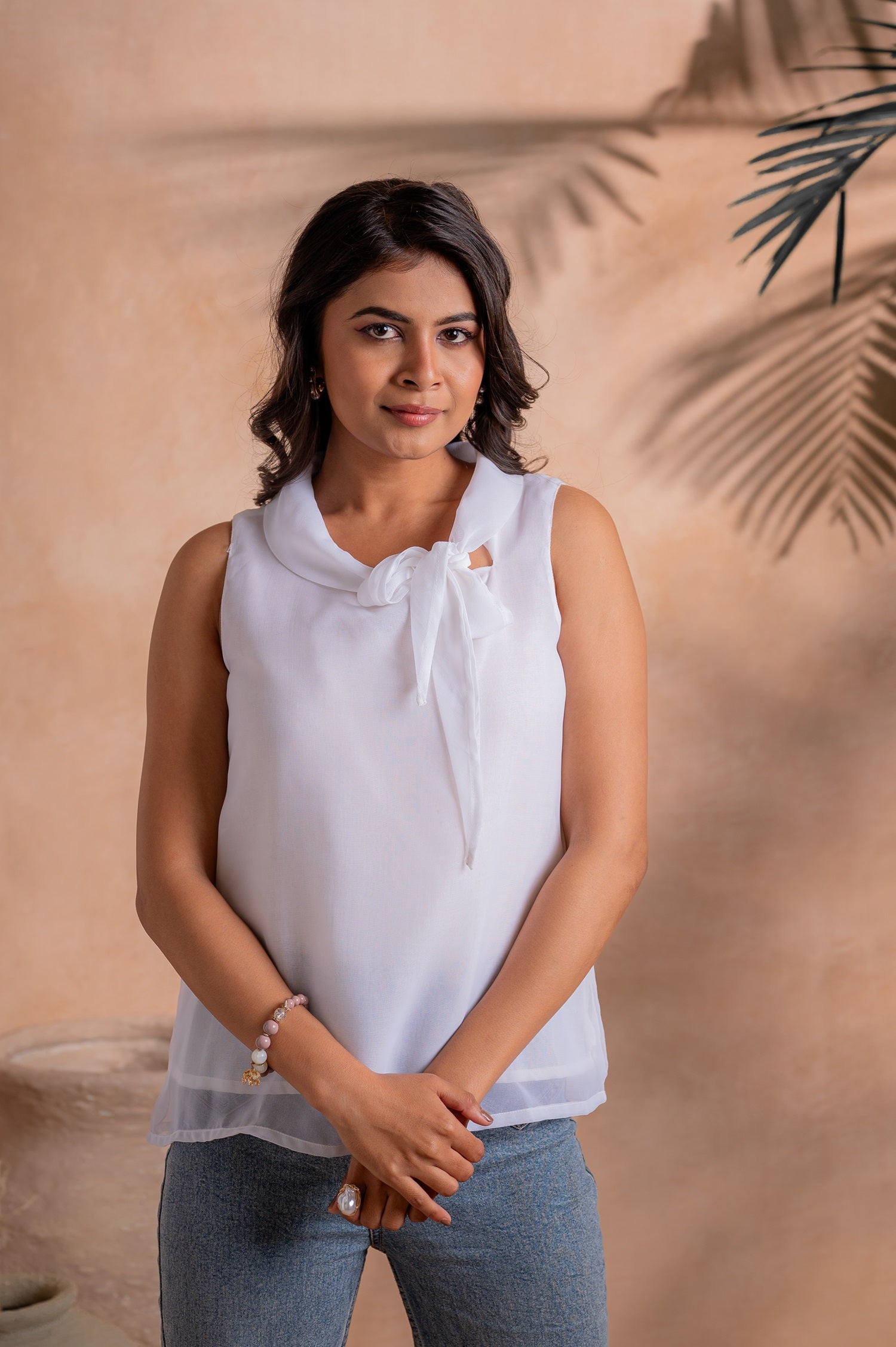 Juniper Lamora Elegant White Sleeveless Bow-Neck Layered Hem Top | Grocsy