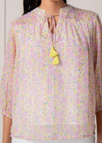 Juniper Lamora Pastel Floral Tie-Neck Peasant Top With Tassels | Grocsy
