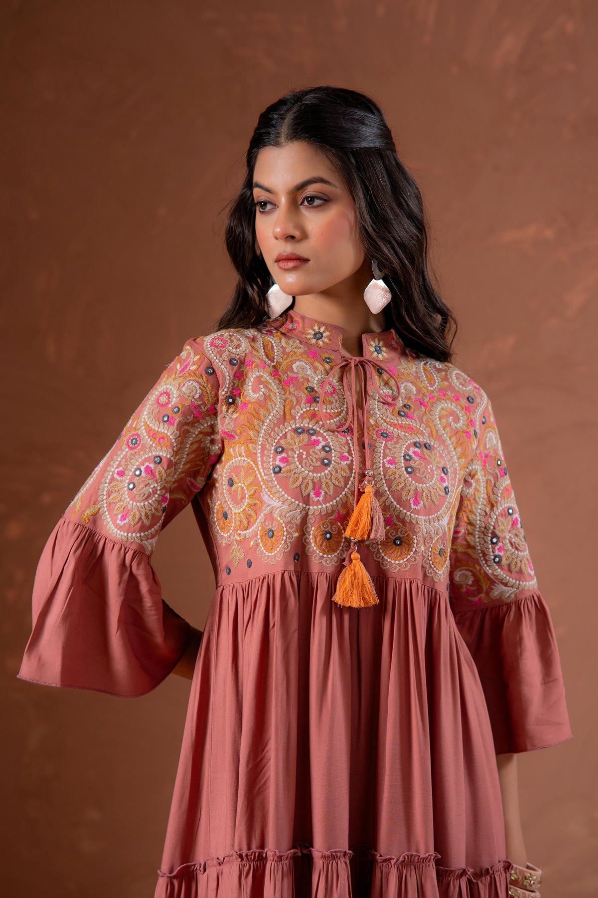 Juniper Rust Tiered Dress With Multicolor Embroidered Yoke And Tassel Tie-Up | Grocsy