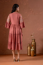 Juniper Rust Tiered Dress With Multicolor Embroidered Yoke And Tassel Tie-Up | Grocsy
