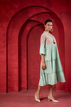 Juniper Sage Green Tiered Dress With Multicolor Embroidered Yoke And Tassel Tie-Up | Grocsy