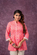 Juniper Orange Blossom Printed Short Peplum Kurti With Lace Sleeves | Grocsy