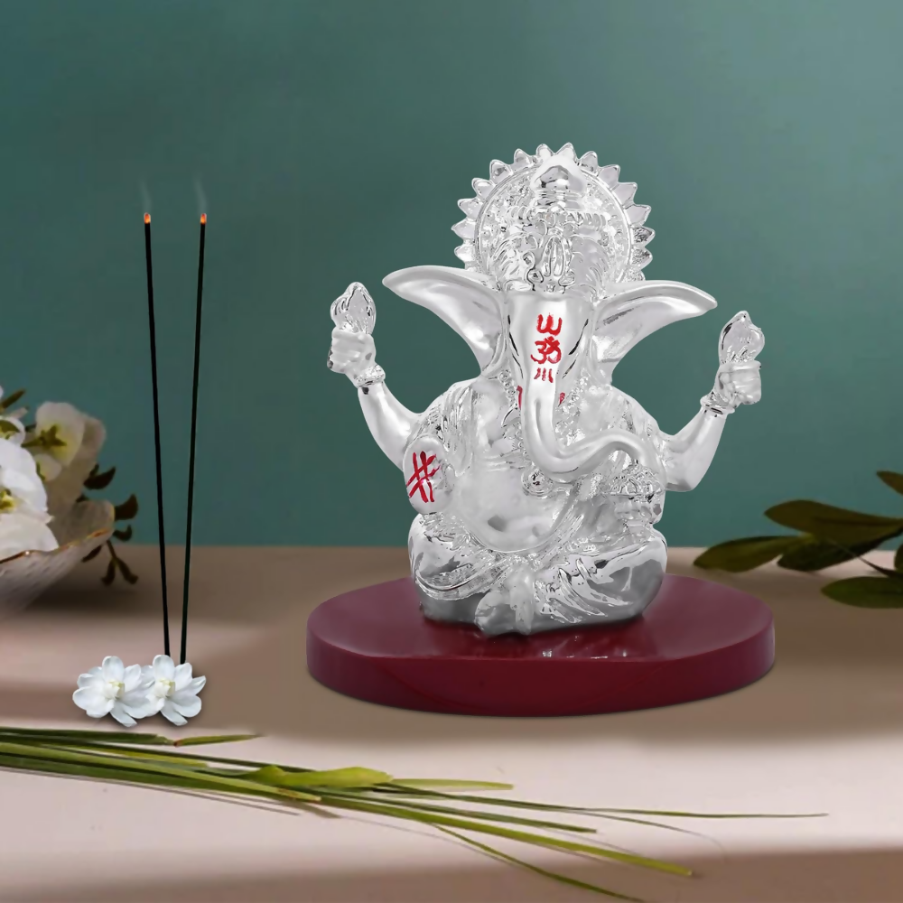 DIVINITI 999 Silver Plated 4 Hand Ganesha Idol | Grocsy
