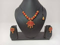 Terracotta Lotus Pendant Necklace Set With Studs-Golden Pink | Grocsy