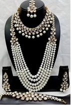 Jewel City Kundan Pearl Bridal Jewelry Set-Traditional Gold-Plated Indian Wedding Necklace Set with Earrings, MaangTikka & Bracelet | Grocsy