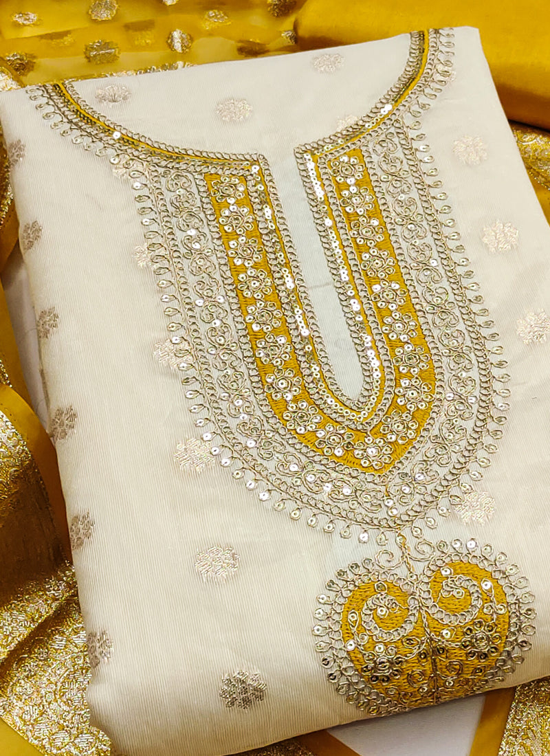 Vegaa Fashion Cream Embroidered salwar suit | Grocsy
