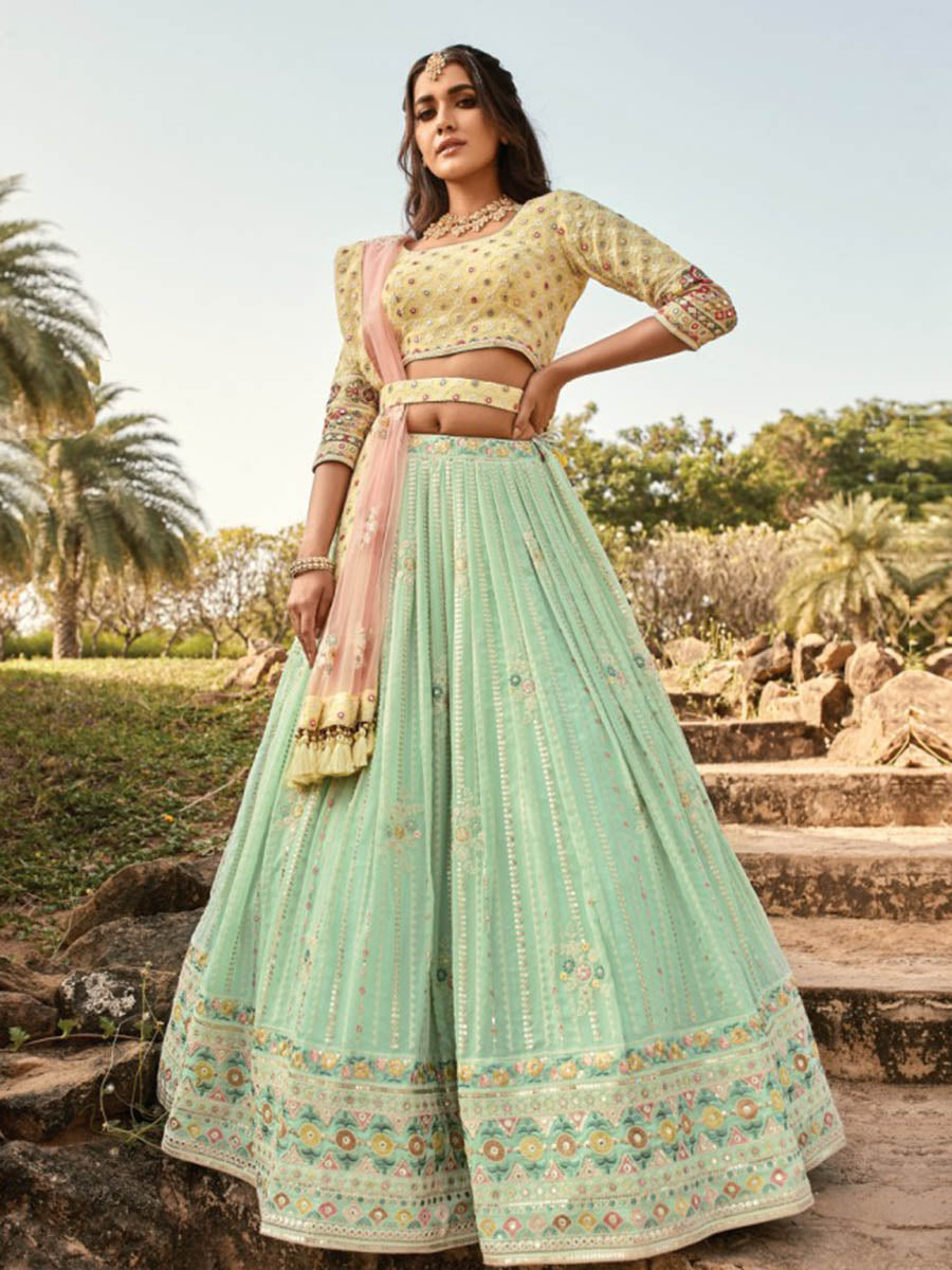 Myra Sea Blue and Lemon Yellow Heavy Embroidered Party Wear Lehenga | Grocsy