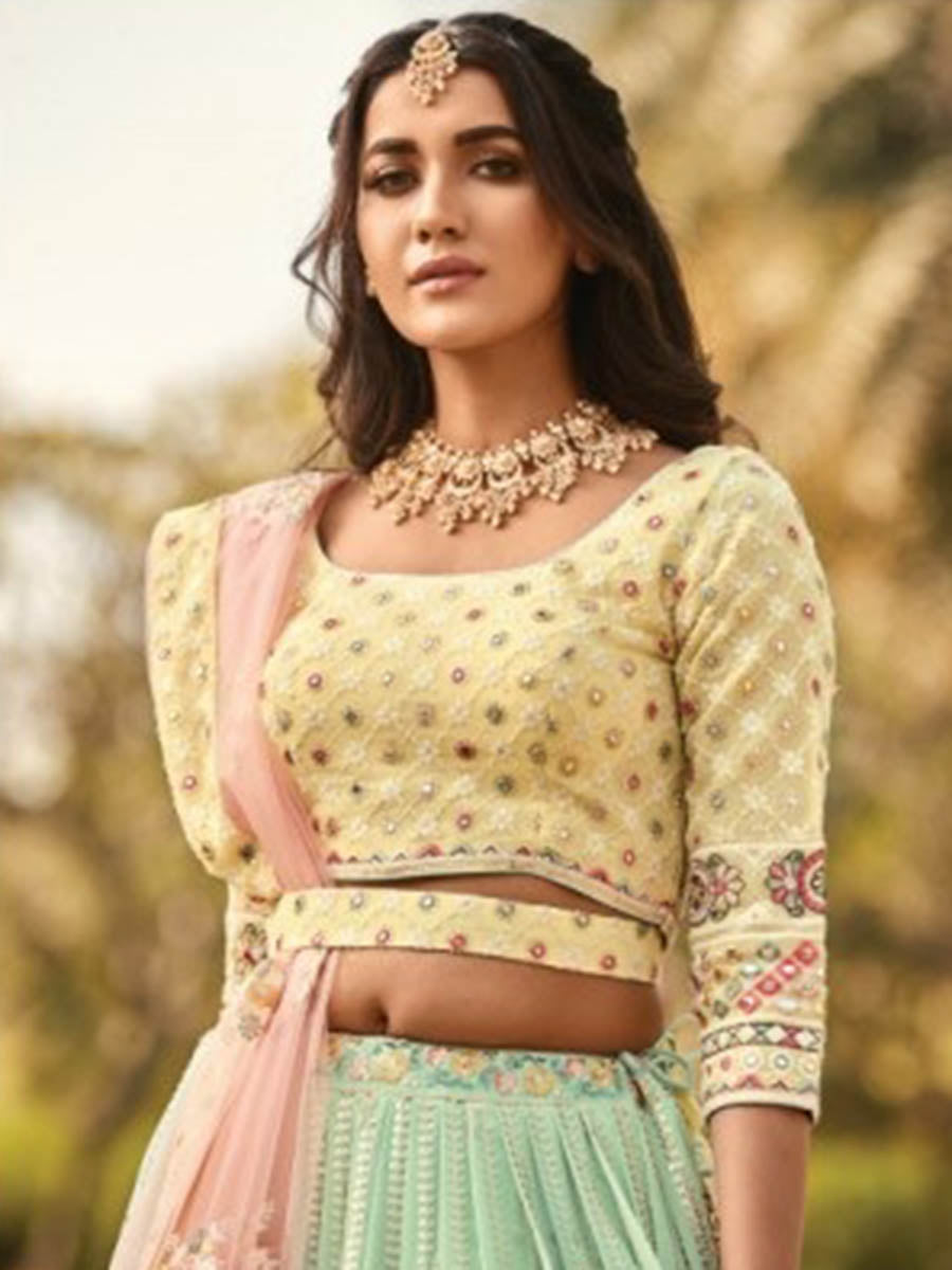 Myra Sea Blue and Lemon Yellow Heavy Embroidered Party Wear Lehenga | Grocsy